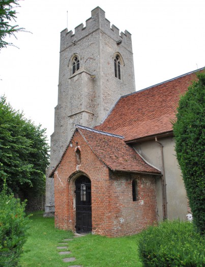 The tower and red brick Tudor porch at Borley Church