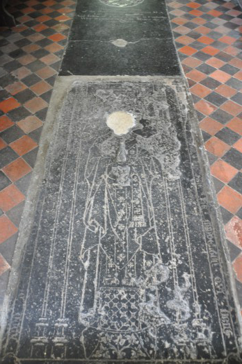 Carved slab at Middleton Church dedicated to 'Sire James Samson' Rector of the Parish who died in 1349