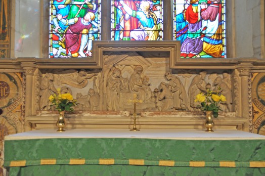Carved stone reredos designed by Henry Woodyer at Liston church