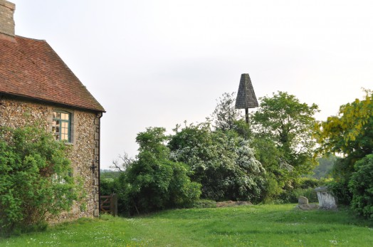 The decoy tower to distract the woodpeckers who caused so much damage