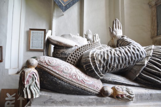 Detail of he tomb, including some still brightly coloured paintt