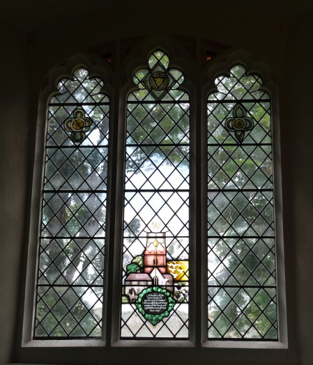 A view of the whole window including the most recent memorial