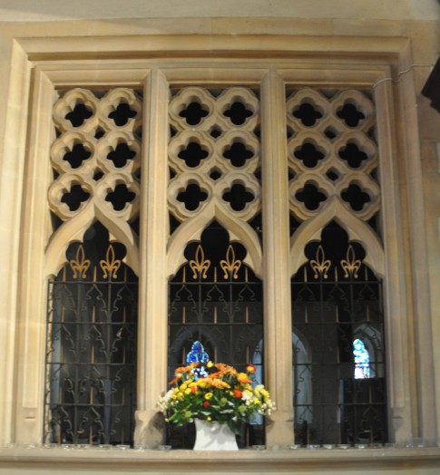 The screen between the chancel and the Palmer Chapel at Liston church