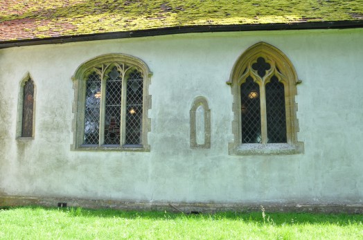 During renovations in the 1970s, two very early slit window frames and a now sealed door were discovered, one of the slit windows was left on display