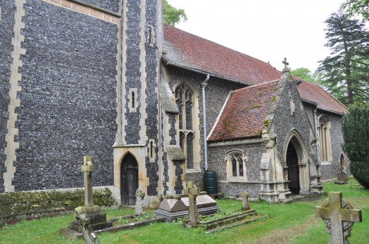 The flint exterior of St Peter and St Paul Church, Foxearth, Suffolk