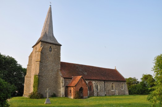 The distinctive twisted spire of the church at Great Henny